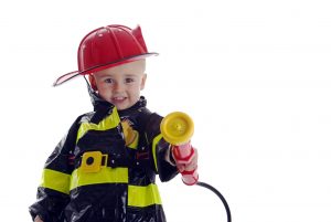 Child dressed as a firefighter