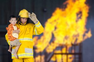 Fireman rescuing child